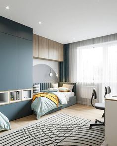 a bedroom with blue walls and white furniture