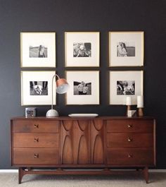 an image of a dresser with pictures on it