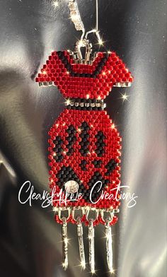 These beautiful Red Dress Earring represent so much meaning, and will look fabulous on. Buy one today. Red Jingle Dress, Red Dress Earrings, Red Beaded Dress, Jingle Dress, Dress Earrings, Seed Bead Jewelry Patterns, Stitch Earrings, Beautiful Red Dresses, Beaded Earring