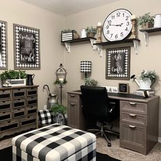 a home office decorated in black and white checkered fabric with lots of decor on the wall