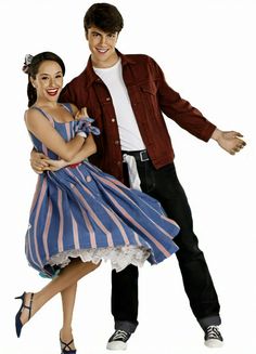 a man and woman are dancing together on a white background