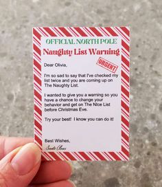 someone is holding up a christmas letter from their neighbor to give out for the holiday season