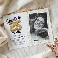 a card with the words cheers to 25 years and a photo of a woman wearing glasses