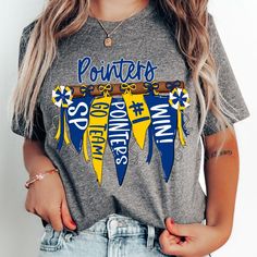 Pointers Navy and Gold Pennant Banner Flag Tee, Custom Spirit Tee, Custom Colors, Mascot, Custom School Name, Unisex Fit Bella Brand Shirt **CUSTOMIZABLE DTF About the print:  The design on this tee is DTF "direct to film" meaning the design is printed on film with special ink then cured and pressed onto the garment. The design will sit on top of the fabric, you will be able to feel the design but the design has a lot softer feel than vinyl but still with very vibrant colors. All materials used are high quality, professional grade. Cheap Customizable Tops For School Spirit, Retro Shirt Design Vintage Style, Gray Cotton School Spirit Tops, Gray School Spirit Top With Letter Print, Gray Tops With Letter Print For School Spirit, Gray Graphic Print Top For School Spirit, School Mascot Shirt Ideas, School Tshirt Designs Spirit Wear, Cheer Shirts Designs