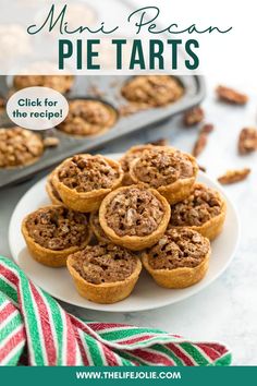 mini pecan pie tarts on a white plate