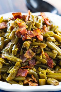 green beans with bacon in a white bowl