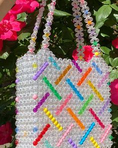 Susanna chow maddie bag.    throw the confetti!! she’s an abundance of energy and joy guaranteed to brighten your day. pair with your favorite blazer and shorts for casual look or dress up with your favorite skirt for summer! now available in two style options - tote or with detachable crossbody strap (so you can go hands-free when you please)!    color: multi-colored    tote dimensions:  height: 7.5” inches  length: 8.5” inches  depth: 3” inches  handle drop: 7��” inches    tote with detachable c Rave Diy, Beaded Bucket Bag, Shoe Makeover, Sour Grapes, Hand Beaded Bag, Bead Bag, Pearl Bag, Interesting Design