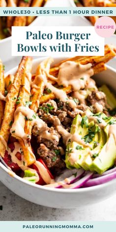 a white bowl filled with fries and meat covered in sauce