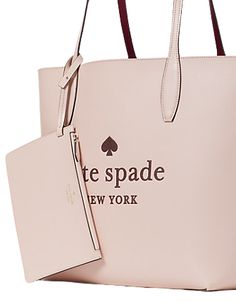 12.6"h x 18.4"w x 6.4"dhandle drop: 11"refined grain leatherembossed logounlinedinterior detachable wristletopen topstyle # k4742Color: Rose Smoke Elegant Logo Bags For On-the-go, Chic Bag With Engraved Logo, Rectangular Bags With Engraved Logo, Coach Horse And Carriage Tote, Kate Spade New York, Kate Spade, Grain, Glitter, New York