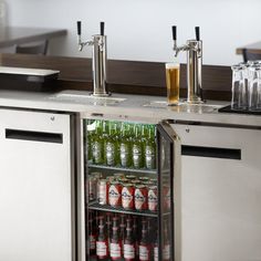 an open refrigerator filled with lots of drinks