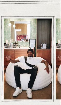 a man is sitting on a bean bag chair