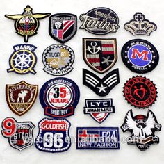 many different patches are displayed on a white surface