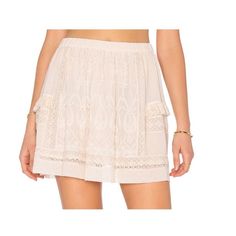 Ulla Johnson Silk Mini Skirt In Cream Color Size Medium New With Tags However The Elastic Is Loose. Needs To Be Cut Open And Made Smaller. Easy Fix On Your End Or Seamstress. Length 15 Inches Summer Beach Mini Skirt With Lace Trim, Vacation Flowy Skirt With Lace Trim, Bohemian Short Mini Skirt For Spring, Flowy Skirt With Lace Trim For Vacation, Feminine Tiered Skirt Bottoms For Beach, Feminine Tiered Mini Skirt For Beach, Feminine Mini Skirt Bottoms With Lace Trim, Feminine Flowy Mini Skirt With Lace Trim, Chic Vacation Skirt With Lace Trim