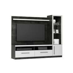 an entertainment center with white drawers and a television on the wall, in black and white