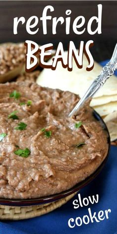 a bowl of refried beans on top of a plate