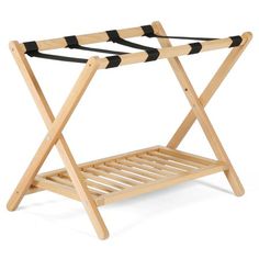 a wooden rack with two black straps on it