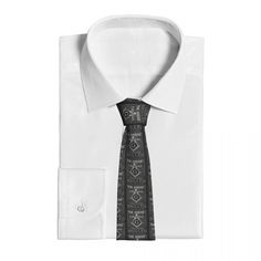 This Master Mason Blue Lodge Necktie is made from high-quality polyester material ensuring that the tie is easy to care for. This necktie features a printed timeless gray color. It is designed with a gray Master Mason emblem woven onto the tie. And crafted with the utmost care and attention to detail, making it durable. This necktie is versatile enough to be worn to a variety of formal events. Whether you're attending a lodge meeting, a banquet, or a wedding, this tie is sure to make a statement Gray Standard Tie For Office, Gray Office Tie, Gray Suit And Tie Accessories For Black Tie Event, Freemason Symbol, Brick Mason, Tie Neck Shirt, Masonic Lodge, Color Complement, Tie Tack