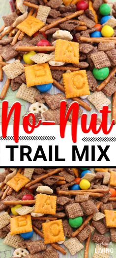 a pile of trail mix made with pretzels, m & m cookies and marshmallows