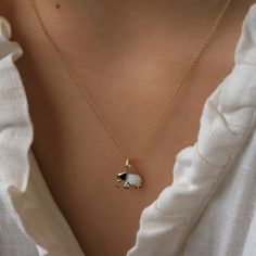 14K Real Gold Necklace Dark Blue White Enamel Elephant Pendant Handmade Minimalist Animal Design Dainty Christmas Elegance Gift for Women ⓂMaterials & Specifications : Necklace Chain Lengths : 42 cm (16.5 in) 44 cm (17.3 in) 46 cm (18.1 in) 48 cm (18.8 in) Elephant Pendant Width : 1.1 cm (0.43 in) Elephant Pendant Length : 0.9 cm (0.35 in) Handmade Item Special Design Elegant Yellow Gold Enamel Charm Necklaces, White Pendant Charm Necklace For Formal Occasions, Elegant White Necklace With Charms, Formal White Pendant Charm Necklace, Elegant Handmade White Charm Necklace, Elegant White Handmade Charm Necklace, Fine Jewelry White Charm Necklaces For Gifts, Fine Jewelry White Charm Necklace For Gift, Elephant Necklace Gold