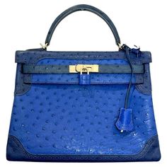 Hermes Kelly Ltd Edition Ghillies Bag In Ostrich Skin Very rare bag, in blue sapphire, blue malte, and blue iris with gold hardware. Keys, clochette and removable shoulder strap. Date stamp 2014. Some of the protective covers are still on the hardware. Size - Height 20cm, Width 32cm, Depth 16cm Condition - Very Good/Excellent Composition - Ostrich Skin Comes With - Dust Bag, Dust Bag For Shoulder Strap, Dust Bag For The Lock & Keys, Shoulder Strap Blue Iris, Hermes Handbags, Wales England, Sapphire Blue, Fashion Handbags, Very Rare, Gold Hardware, Blue Sapphire, Dust Bag