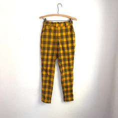 Vintage Hot Topic Yellow and Black Plaid Pants. Clueless Style. Skinny Fit. High-Waisted Pants. Pockets. Grunge Style. Emo. Y2K. 2000s. Really great condition. Stretchy. Accessories (unless otherwise stated): n/a Approx. Measurements: - 26"-30" waist - 42" hips - 11" rise - 28" inseam For exact / add'l measurements, please DM us. 🙂 Vintage and pre-owned items may show signs of  imperfection and/or usage, see pics.  Sold as is. Shipping UPDATE:  - please see shipping times for estimated ship/delivery times.  - your patience is appreciated, thanks. Domestic SHIPPING:  - as usual, we ship very fast and very efficient.  - we may use recycled packages / packaging   - helps alleviate shipping costs   - environment friendly INT'L SHIPPING:  - we happily ship to overseas clients  - contact us for Vintage Hot Topic, Clueless Style, Black Plaid Pants, Clueless Fashion, Emo Y2k, Plaid Pants, Yellow And Black, Grunge Style, Environment Friendly