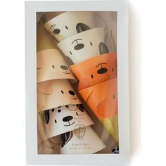 a group of paper hats with dogs on them