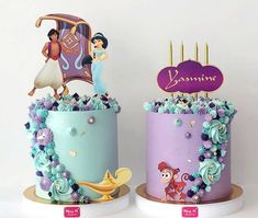 two cakes decorated to look like disney princess and the frog with their names on them