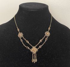 Topaz rhinestone filigree flower, bezel marquise rhinestone dangles necklace. Victorian Revival  Unmarked  Very good to excellent condition, vintage  L - 15.5" -18" adjustable, lobster clasp  05/07/24 2066 Bohemian Wedding Necklace With Rhinestones, Elegant Jeweled Dangle Necklaces, Elegant Filigree Dangle Necklaces, Costume Jewelry Rhinestone Dangle Necklace, Elegant Dangle Necklace With Filigree Details, Elegant Vintage Charm Necklace With Flower Pendant, Elegant Vintage Charm Flower Pendant Necklace, Elegant Necklace With Vintage Flower Pendant, Elegant Vintage Flower Pendant Necklace