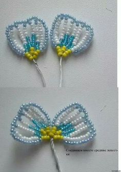 two pieces of white and blue beaded hair accessories with yellow flowers on each side