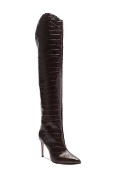 Allover croc embossing adds distinctive character to an over-the-knee boot fashioned with a pointy toe and sleek stiletto heel. 3 1/2" heel, 16 1/2" shaft, 14" circumference (size 8.5) Leather upper, lining and sole Made in Brazil Wide Calf Tall Boots, Knee Boot, Shoe Boutique, Tall Boots, Stiletto Heel, Over The Knee Boots, Over The Knee, Fashion Boots, Dark Chocolate