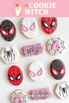 the cookies are decorated with spiderman and pink icing, along with words that read cookie witch