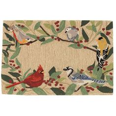 a rug with birds and berries on it