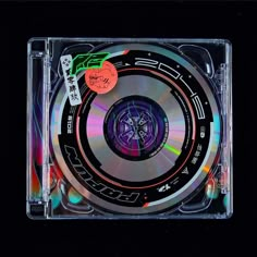 a cd case with an abstract design on it