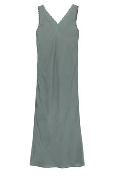 Cassia is our new vintage inspired slip for A|W22 in our new shade Kingfisher Green. Cut on the bias, this slip drapes beautifully over the body and is made in the softest modal satin for added luxury. A flattering V-neck at both the back and front of the dress is finished with an intricate embroidered scalloped edge. There is a delicate lace around each armhole which adds to the vintage charm. A beautiful nightgown to sleep in and equally as fabulous as a slip dress paired with a jumper and boo Beautiful Nightgown, Uk Size 16, French Seam, Kingfisher, Scalloped Edge, New Vintage, The Body, Night Gown, Basic Tank Top