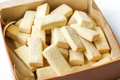 a box filled with sugar cubes on top of a table