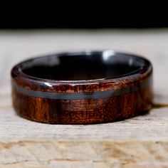 a wooden ring sitting on top of a table