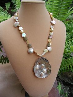 Mother of Pearl Oyster Pendant Original Beaded by rrdesigns561 Iridescent Necklace, Jewelry Pearl Necklace, Pearl Oyster, Golden Highlights, Original Necklace, Golden Beads, Beach Necklace, Oyster Pearl, Beach Necklaces