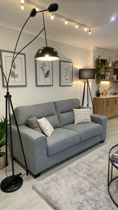 grey couch living room Dark And Moody Living Room, Modern Lighting Ideas, Moody Living Room, Living Room Aesthetic