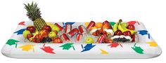 an inflatable fruit platter is shown with apples, bananas, pineapples and other fruits