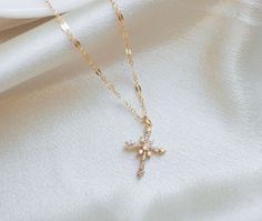 ∙ ∙ S P A R K L I N G ∙ C R O S S ∙ N E C K L A C E ∙ ∙ Made with the following: Gold Plated Cross 23mm x 9mm 14K Gold Filled Findings  14K Gold Filled Spring Clasp 14K Gold Filled Chain This listing is for one necklace. The third picture shows the necklace paired with the Mini Paperclip Necklace https://www.etsy.com/listing/985278174/ and the Sweet to the Soul Necklace https://www.etsy.com/listing/766035933/ (sold separately). ∙ ∙ H O W ∙ T O ∙ O R D E R ∙ ∙ Please select the chain and length f Christian Necklace For Women, Crucifix Cross Necklace With Clavicle Chain As Gift, Gift Cross Pendant Necklace With Clavicle Chain, Gift Cross Necklace With Clavicle Chain, Dainty Pendant Cross Necklace For Gift, Dainty Cross Pendant Necklace For Gift, Dainty Cross Pendant Necklace As Gift, Dainty Pendant Cross Necklace, Dainty Cross Necklace For Gift