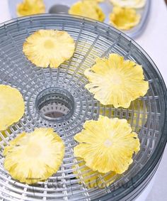 pineapple slices are placed on the bottom of a juicer to cool them off