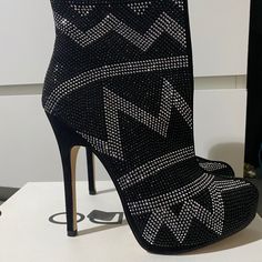 Brand New Never Worn, Old But Never Worn. Size 8.5 But I’m A 9 So They Don’t Fit Me. I Love These . Comes With Box And Heel Tips. Glamorous Boots With Silver Studs For Night Out, Elegant Black Boots With Bling, Glamorous Silver-studded Boots For Night Out, Black Evening Boots With Bling, Glamorous High Heel Boots With Silver Studs, Black Rhinestone Ankle-high Heels, Elegant Black Sparkling Boots, Black High Heel Boots With Bling, Elegant Round Toe Boots With Silver Studs