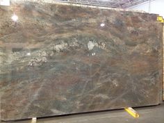 a large slab of granite in a warehouse