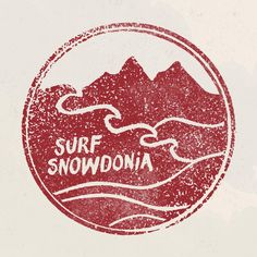 a red stamp with the words surf snowdonia written inside it and mountains in the background