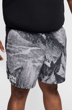 An Alps-inspired print covers these ready-to-move shorts designed with Dri-FIT moisture-wicking technology, handy pockets to hold essentials and an ergonomic brief liner that feels smooth and supportive. 7" inseam Elastic/drawstring waist Side-seam welt pockets; back zip pocket Interior brief Dri-FIT moisture-wicking technology 100% polyester with 94% polyester, 6% elastane contrast Machine wash, line dry Imported Nike Athletic Nylon Shorts With Elastic Waistband, Nike Nylon Athletic Shorts For Outdoor, Nike Outdoor Activewear With Built-in Shorts, Nike Activewear For Outdoor With Built-in Shorts, Nike Moisture-wicking Athletic Shorts For Outdoor, Nike Swim Trunks With Built-in Shorts, Nike Athletic Shorts With Elastic Waistband For Gym, Nike Go-dry Shorts For Outdoor Activities, Nike Nylon Athletic Shorts