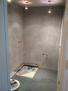 a bathroom that is being remodeled and painted