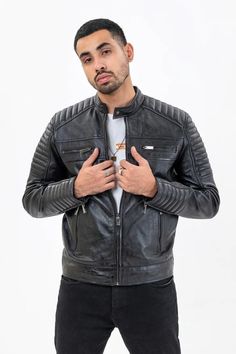 Upgrade your outerwear with our Black Men's Leather Jacket, available exclusively at LooksVillage. Crafted from premium sheepskin leather, this jacket combines rugged durability with sleek style. The Biker design offers both warmth and comfort, while the full-length zipper ensures a snug fit, perfect for chilly days. At LooksVillage, we pride ourselves on delivering high-quality products and exceptional customer satisfaction. We ship internationally, so no matter where you are, you can experienc Biker Design, Moto Vintage, Lambskin Leather Jacket, Men's Leather Jacket, Sleek Style, Zipper Jacket, Sleek Fashion, Leather Zipper, High Class