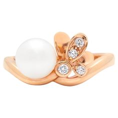 Mikimoto 'Dandelion' collection pearl & diamond ring set in 18k rose gold. The ring features a Akoya pearl with a slight pinkish hue set with a floral design with four round brilliant-cut diamonds 0.06 carats. The ring has been fully Authenticated by our expert team. Retail price £2,600 Hallmarked: M symbol, 750 and UK gold convention hallmarks for 18k gold Pearl measurements: approximately 7mm Ring size: UK M, US 6, EU 52 3/4 Weight: 4.9 grams Diamonds: 4 round brilliant-cut diamonds of approx Luxury Rose Gold Diamond Pearl Ring, Fine Jewelry Pearl Ring With Diamonds In Rose Gold, M Symbol, Pearl Diamond Ring, Tiffany Rose, Rose Gold Pearl, Diamond Ring Set, Pearl And Diamond Ring, Diamond Ring Settings