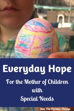 a child holding an egg with the words everyday hope for the mother of children with special needs