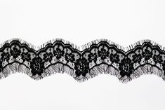 an image of black lace on white background